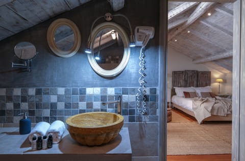 Deluxe Suite, Balcony - Attic (Adiandi Building, 3rd floor, stair access only) | Bathroom | Shower, hair dryer, slippers, towels