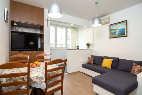 Apartment, 2 Bedrooms | Living area | Flat-screen TV