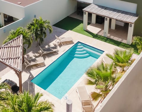 Ptivate pool in secluded tropical garden with spacious pool deck 