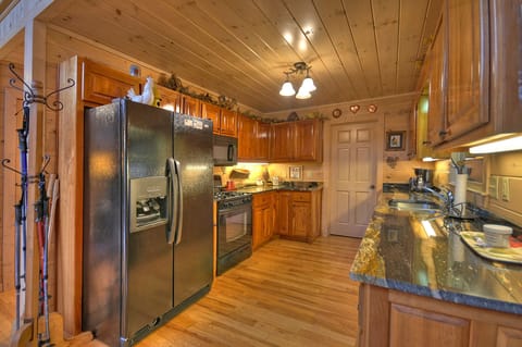 Large kitchen with plenty of cabinetry and pantry space