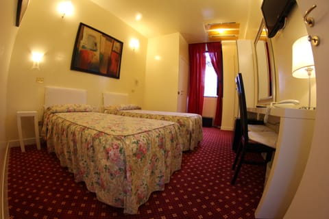 Double or Twin Room | Down comforters, in-room safe, desk, blackout drapes