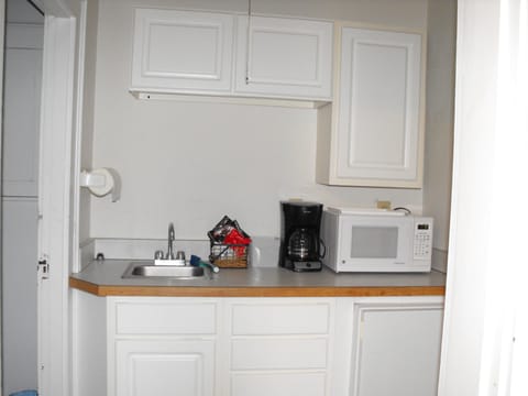 Deluxe Room, 1 Queen Bed, River View | Private kitchen | Shared fridge, microwave