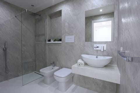 Standard Double Room, Balcony, City View | Bathroom | Shower, rainfall showerhead, free toiletries, hair dryer