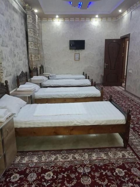 Luxury Quadruple Room | In-room safe, bed sheets