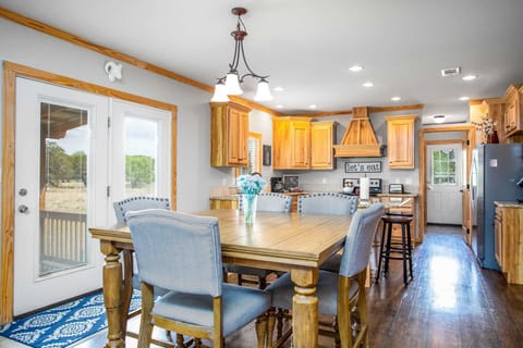 In the dining area, you'll have your choice of sitting around the table, or at the counter on bar-style seating!