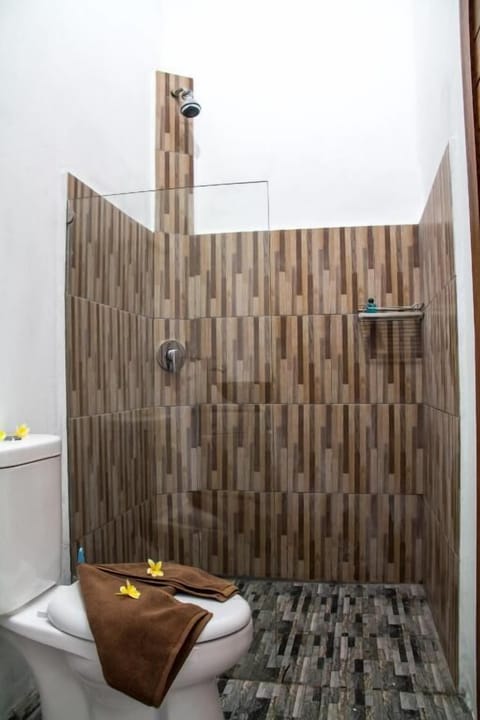 Shower, slippers, towels, soap