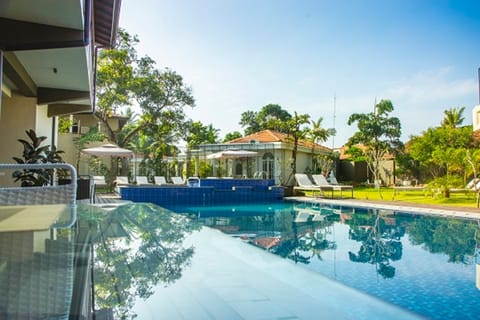 Outdoor pool, open 8:00 AM to 7:00 PM, sun loungers