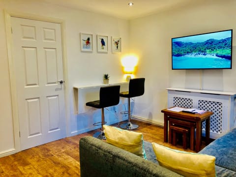 Fountain View Apartment | Living area | 50-inch flat-screen TV with satellite channels, TV