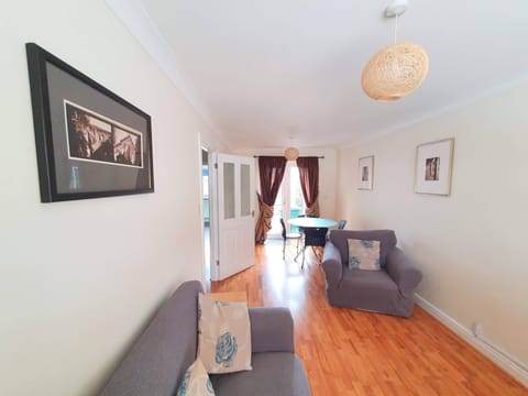 House | Living room | 30-inch TV with digital channels, DVD player