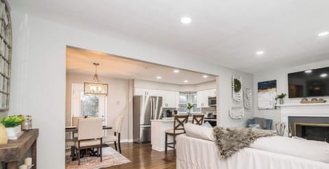  Kick
off your stay by
settling into
this wide-open
living space,
where the
sectional,
fireplace, and
flat-screen TV
pull the whole
group together
for movie
nights.