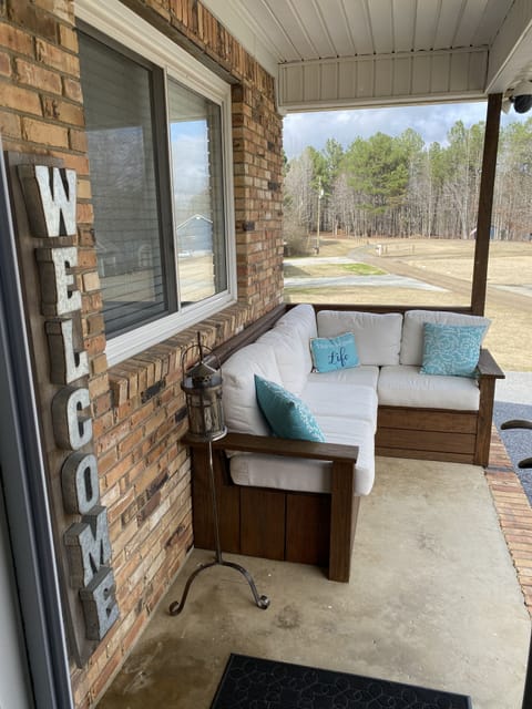 Comfy Bench seating overlooking the lake, great for relaxing with a good book