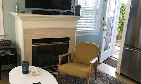 Living area and backdoor exit to beach shed.