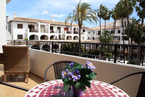 Morning coffee on the balcony overlooking the plaza