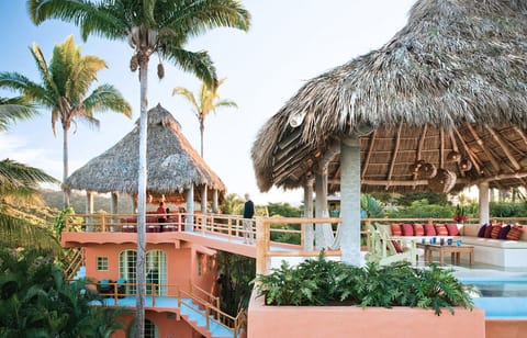 View of the living area with hot tub and connecting bridge
