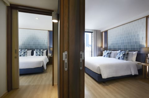 2 Bedroom Suite | Minibar, in-room safe, blackout drapes, iron/ironing board