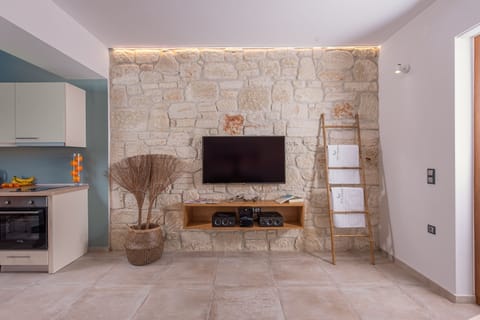 Junior Suite, Sea View | Living area | 50-inch flat-screen TV with cable channels, TV