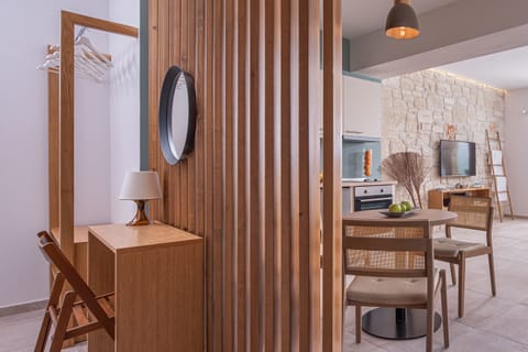 Junior Suite, Sea View | Living room | 50-inch flat-screen TV with cable channels, TV