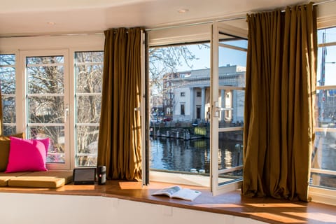 Apartment, 1 Double Bed, Canal View | Living area | Tablet, heated floors