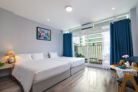 Family Room | Minibar, desk, iron/ironing board, free WiFi