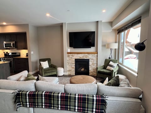Relax in our cozy living room after a good day of skiing. 