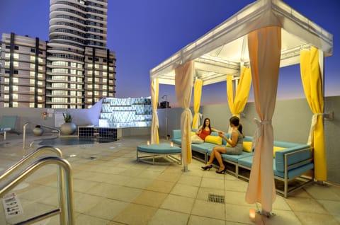 Outdoor pool, open 6:00 AM to 11:00 PM, free cabanas, sun loungers