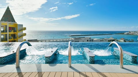 Seasonal outdoor pool, open 8:00 AM to 8:00 PM, lifeguards on site