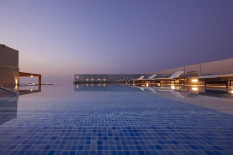 Outdoor pool, open 7:00 AM to 8:00 PM, pool umbrellas, sun loungers