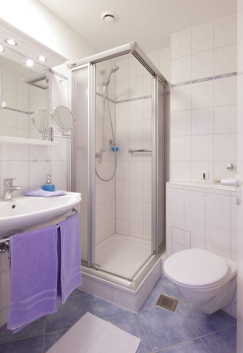 Shower, free toiletries, hair dryer, towels