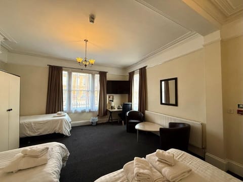 Family Room | Hypo-allergenic bedding, desk, laptop workspace, soundproofing