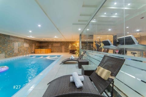 Indoor pool, sun loungers