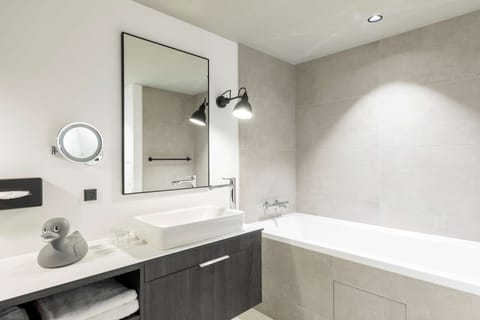 Eco-friendly toiletries, hair dryer, towels, soap