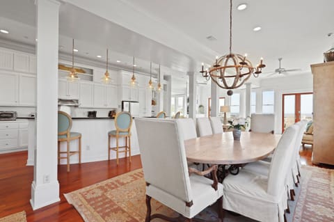 Dining Room with seating for ten at the dining table table and five at the kitchen bar top