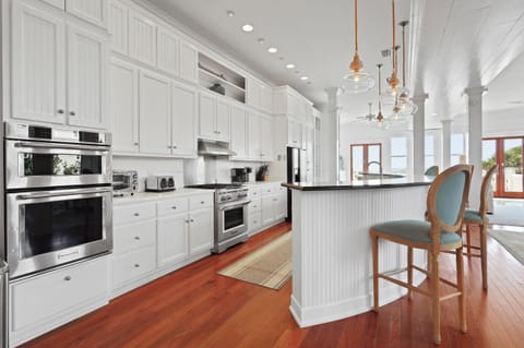 Gourmet kitchen with gorgeous views of the ocean!