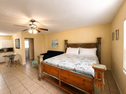 Our king bed is the best spot to relax after a long day at the beach.