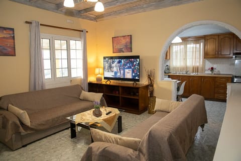 Maria’s House Arillas Corfu- living room and TV