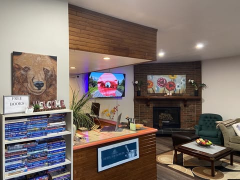 32-inch TV with satellite channels, pay movies