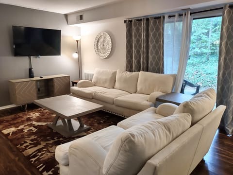 living room on ground level with balcony 