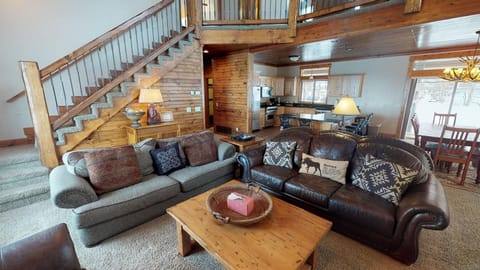 The living room offers a welcome environment to relax after a long day and connect with others.