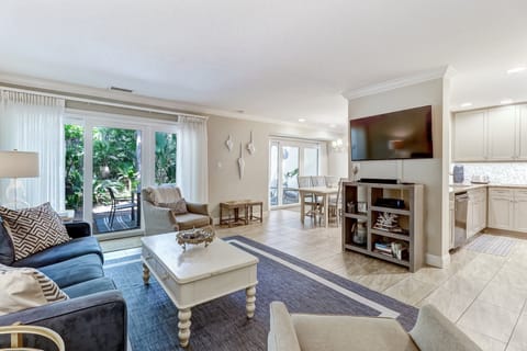 Living Area with a Flat Screen TV and a Sleeper Sofa with a Gel Mattress