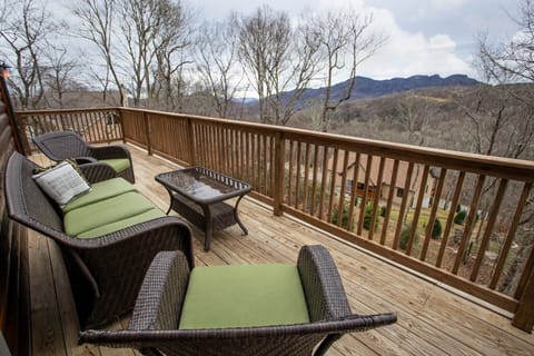Enjoy the Mountain Views from the Comfortable Outdoor Sofa and Flanking Armchairs at Sugar Bear