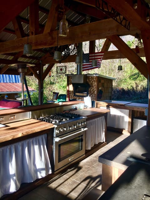 Outdoor kitchen in pavilion.
