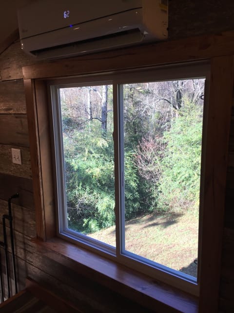 View out bedroom window. Window has light blocking shade (not pictured).