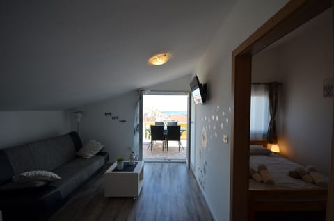 Apartment A1 | Living area | Flat-screen TV