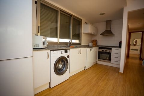 Apartment, 2 Bedrooms, Sea View | Private kitchen | Full-size fridge, stovetop, highchair, cookware/dishes/utensils