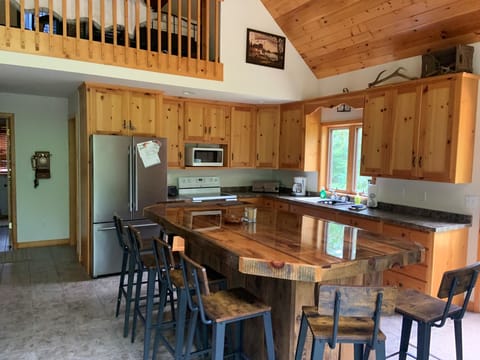 Large kitchen for gathering or eating. 
