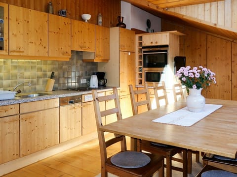 Furniture, Cabinetry, Property, Table, Countertop, Flower, Chair, Plant, Wood, Interior Design