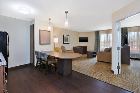 Desk, laptop workspace, blackout drapes, iron/ironing board