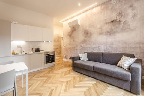Apartment, 1 Bedroom | Living area | Flat-screen TV