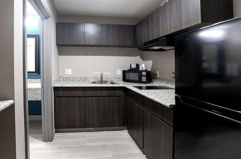 Room, 2 Queen Beds | Private kitchenette | Full-size fridge, microwave, coffee/tea maker