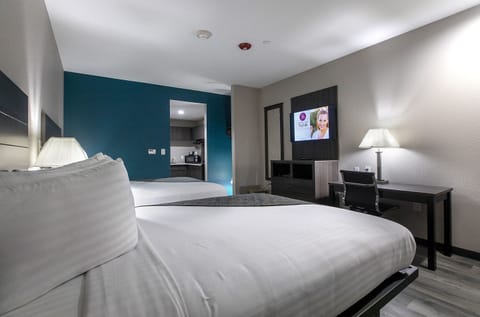 Room, 2 Queen Beds | Individually furnished, desk, iron/ironing board, free WiFi